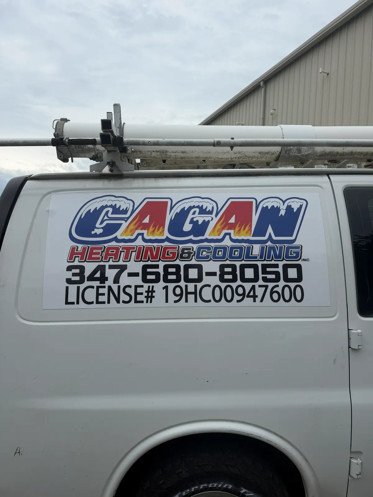 GAGAN HEATING & COOLING lettering — door