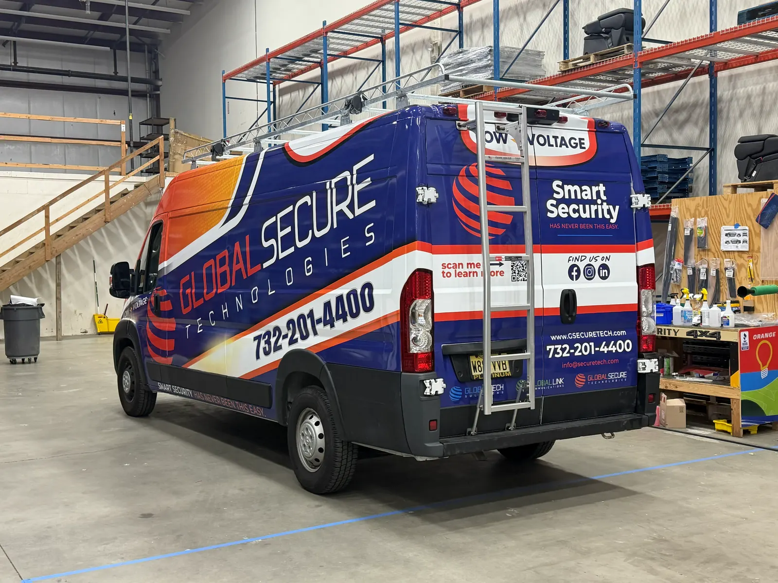 GLOBAL SECURE TECHNOLOGIES full wrap — rear three-quarter, in the shop