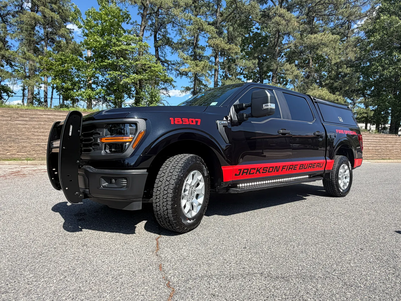 JACKSON FIRE BUREAU stripes + lettering — front three-quarter
