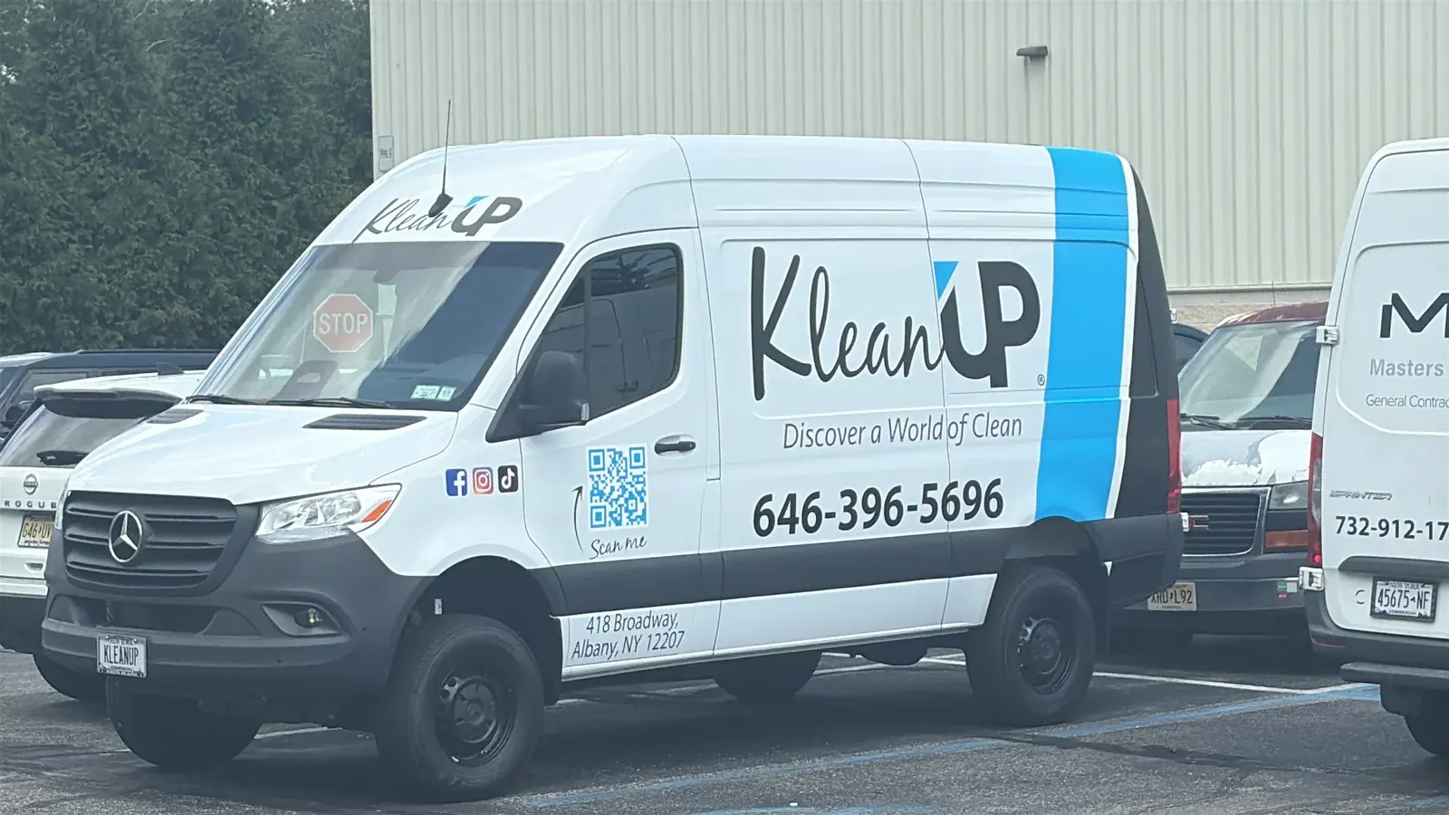 KLEANUP partial wrap — front three-quarter
